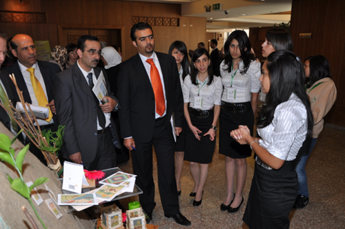 Mr. Jamal Milhem, Executive Director of Talal Abu-Ghazaleh & Co. International -Ramallah Office listens to participants in INJAZ Palestine Students' Competition